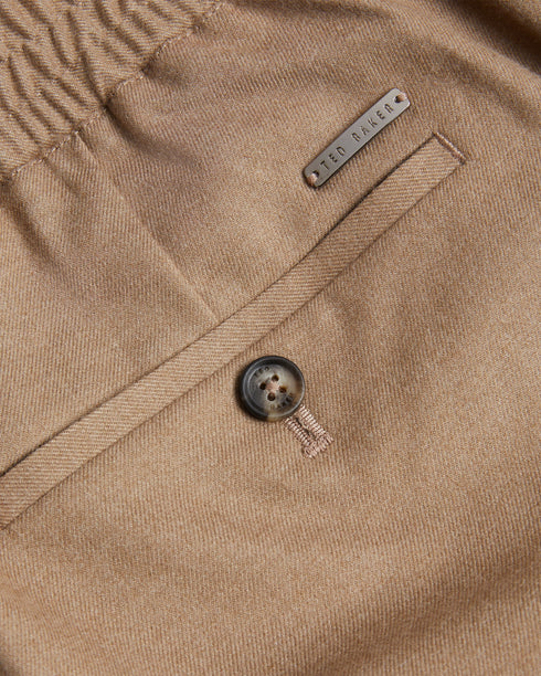 GIGGS-Trousers-Dress GIGGS up or down with ease. With a convenient zip and button fastening, these trousers are both versatile and stylish. The added drawcord in the waistband ensures a comfortable and adjustable fit. Trousers Slim fit Zip and button fastening Pockets Drawcord in waistband Branded tabs- Ted Baker Romania