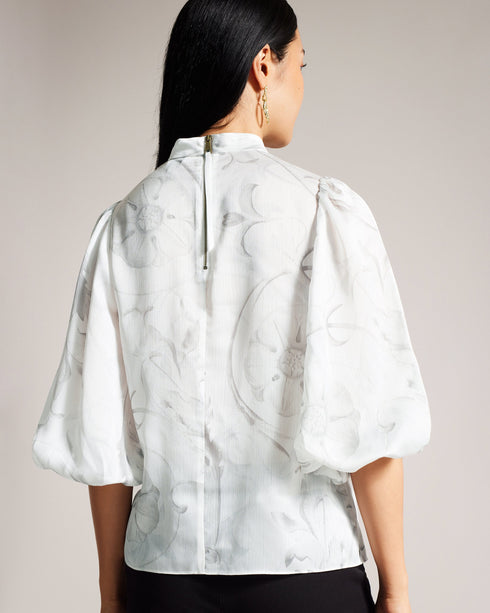 LILIOH-Tops-Unleash your inner flower child with LILIOH. With half-length balloon sleeves and a delicate floral print, it's perfect for when you want to make a statement without saying a word. Blouse Half length balloon sleeves High neck Half zip fastening Delicate floral print- Ted Baker Romania