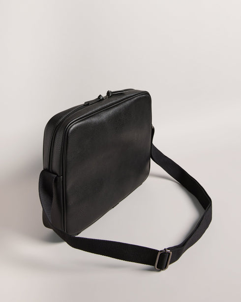 EVVAN-Bags-The embodiment of suave style, the EVVAN crossbody bag in faux leather features a distinguished striped design. It features an adjustable shoulder strap for versatility and comfort in carrying. Crossbody bag Faux leather Striped design Adjustable shoulder strap Zip fastening Internal pocket Dimensions: 7cm x 27cm x 37cm- Ted Baker Romania