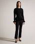 LILLYYY-Knitwear-A modern take on a classic silhouette, our LILLYYY top is the perfect pairing for any occasion. With long sleeves and scalloped trim, it’s easy to see why this one is a must-have. Peplum top Long sleeves with flared cuff Scalloped trim Crew neck Slim fit- Ted Baker Romania