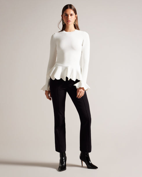 LILLYYY-Knitwear-A modern take on a classic silhouette, our LILLYYY top is the perfect pairing for any occasion. With long sleeves and scalloped trim, it’s easy to see why this one is a must-have. Peplum top Long sleeves with flared cuff Scalloped trim Crew neck Slim fit- Ted Baker Romania