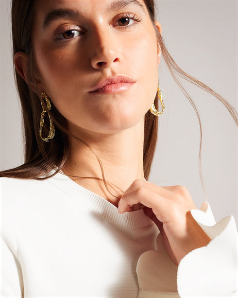 LILLYYY-Knitwear-A modern take on a classic silhouette, our LILLYYY top is the perfect pairing for any occasion. With long sleeves and scalloped trim, it’s easy to see why this one is a must-have. Peplum top Long sleeves with flared cuff Scalloped trim Crew neck Slim fit- Ted Baker Romania