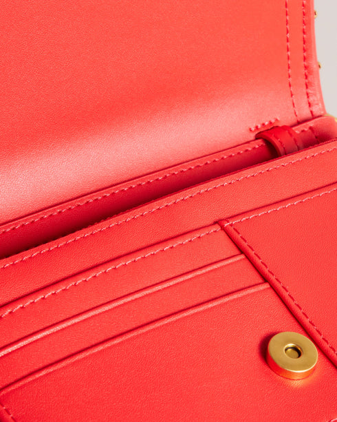 KAHNISA-goods-Carry around your card collection with KAHNISA. This leather purse has all of the card slots and zip compartments you'll ever need, with a fold over cover to keep them safe. The adjustable chain & leather shoulder strap allows for stylish carrying, finished with a studded trim for maximum style. Leather purse Studded trim Zip coin compartment Multiple card slots Foldover cover with magnetic fastening Adjustable chain and leather shoulder strap External zip pocket Dimensions: 10.5cm x 2.5cm- Te