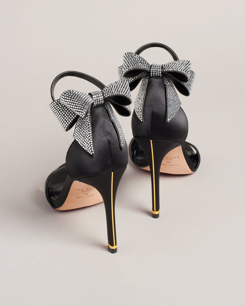 HEMARY-Sandals-We've made the perfect party shoe with HEMARY. With a stiletto heel and crystal embellished bow at the back, these satin sandals are as elegant as they are daring. Slip into the slim open toe strap and secure the buckle ankle fastening, and you're ready to dance the night away. Heeled sandals Satin finish Crystal bow embellishment Open toe Slim toe strap Stiletto heel with golden detail Buckle ankle strap- Ted Baker Romania
