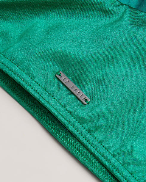 LIENNAA-Swimwear-Take on the sun with the LIENNAA bikini top. Featuring one shoulder and a bow embellishment, it's just the thing for sipping cocktails on the beach. Bikini top One shoulder Bow embellishment on sleeve Metal branded plaque- Ted Baker Romania