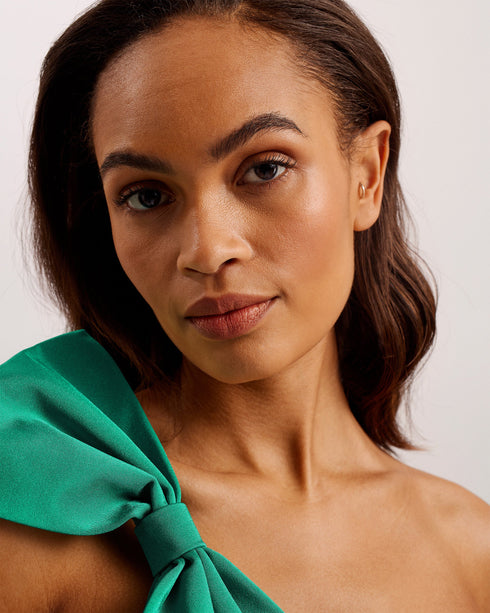 LIENNAA-Swimwear-Take on the sun with the LIENNAA bikini top. Featuring one shoulder and a bow embellishment, it's just the thing for sipping cocktails on the beach. Bikini top One shoulder Bow embellishment on sleeve Metal branded plaque- Ted Baker Romania