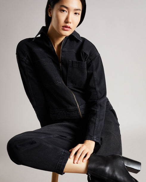 ALEYAH-Trousers-Get your wardrobe jumping for joy with the addition of ALEYAH. Bringing a statement for all seasons, this denim jumpsuit zips up at the front allowing for the ultimate cover-up or a slightly more revealing statement depending on your event. Pair with chunky boots for a more dressed up look, or match with simple trainers and a plain t-shirt for a casual day vibe. The fabric of this product contains organic cotton. Organic cotton has a proven lower environmental impact than conventional cotton