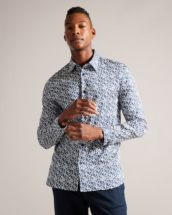 CAPUA-Shirts-Revamp your wardrobe with our CAPUA shirt, crafted from a comfortable cotton blend. This shirt is a must-have, featuring a charming ditsy floral print that adds a playful touch to your look. Button up shirt Cotton blend Ditsy floral print Long sleeved Classic collar- Ted Baker Romania