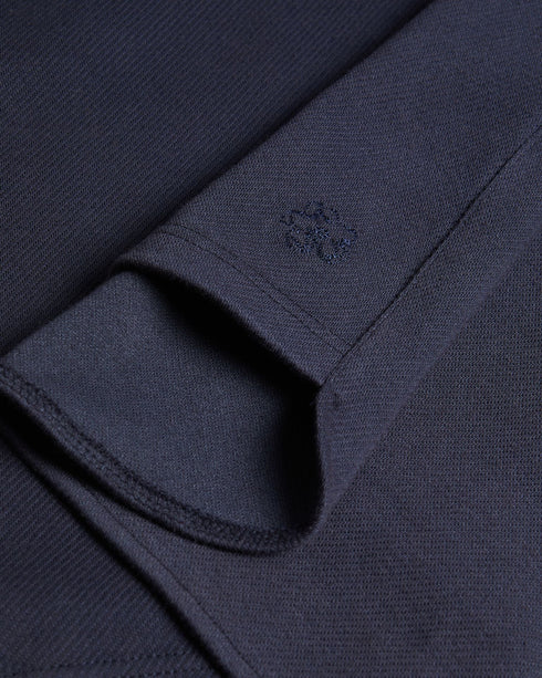 BADDOW-Tops-Hey, smooth operator. The BADDOW polo shirt is crafted from solid cotton twill, detailed with a buttoned collar and embroidered logo at the sleeve. Classic and comfy – it's perfect shirt for days in the office. The fabric of this product is made of organic cotton. Organic cotton has a proven lower environmental impact than conventional cotton, as it reduces water usage, greenhouse gas emissions, and eliminates the use of harmful chemicals in the farming process. Twill polo shirt Made from cott