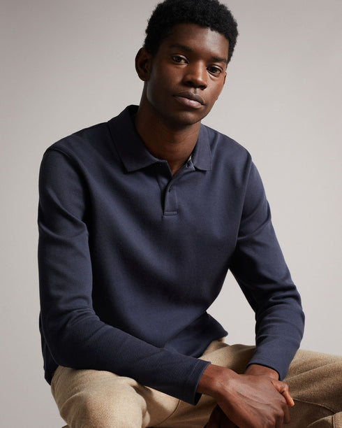 BADDOW-Tops-Hey, smooth operator. The BADDOW polo shirt is crafted from solid cotton twill, detailed with a buttoned collar and embroidered logo at the sleeve. Classic and comfy – it's perfect shirt for days in the office. The fabric of this product is made of organic cotton. Organic cotton has a proven lower environmental impact than conventional cotton, as it reduces water usage, greenhouse gas emissions, and eliminates the use of harmful chemicals in the farming process. Twill polo shirt Made from cott