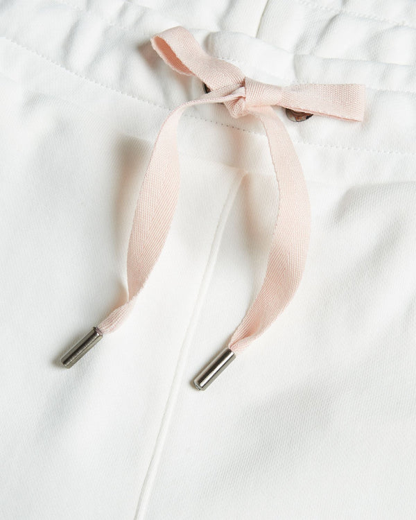 DORRINE-Trousers-A classic pair of jersey joggers are a wardrobe staple. Offering the best in comfort, DORRINE will take you from a workout to elevated loungewear without missing a beat. An embroidered magnolia and constrasting drawstring complete the look for a tried and true modern style. Ted Baker womenswear collection Jersey joggers Magnolia branding Elasticated drawstring waist Stretch fabric Our model is 5'9"/ 1.75m and wears a Ted size 1- Ted Baker Romania