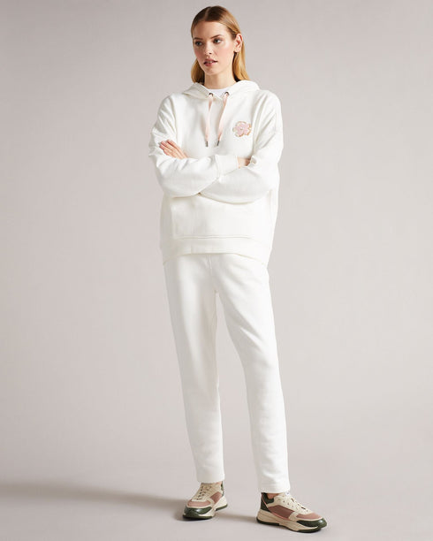 DORRINE-Trousers-A classic pair of jersey joggers are a wardrobe staple. Offering the best in comfort, DORRINE will take you from a workout to elevated loungewear without missing a beat. An embroidered magnolia and constrasting drawstring complete the look for a tried and true modern style. Ted Baker womenswear collection Jersey joggers Magnolia branding Elasticated drawstring waist Stretch fabric Our model is 5'9"/ 1.75m and wears a Ted size 1- Ted Baker Romania