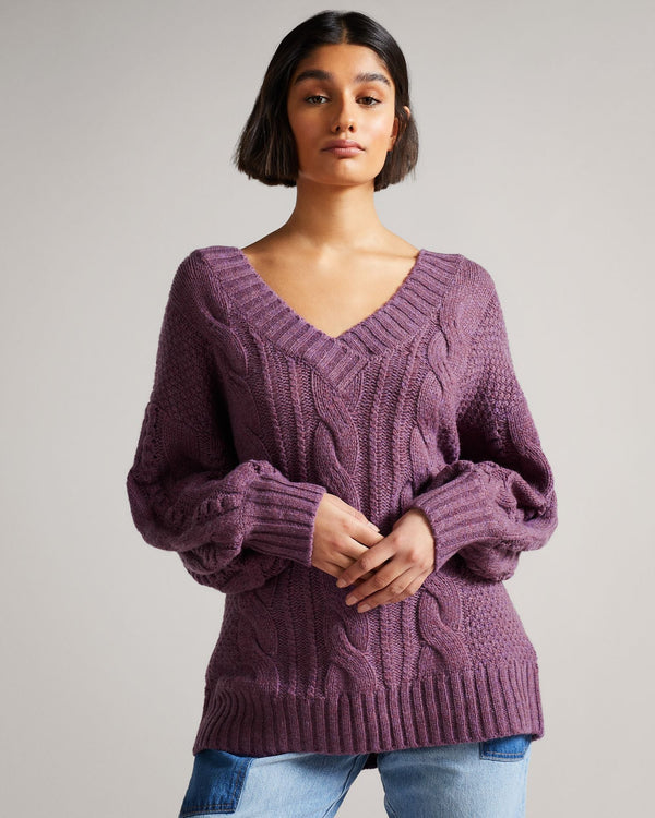 GAIAA-Knitwear-Simple, casual, and comfy … not where GAIAA is concerned. While this bobble knit jumper retains all the classic features that we've come to know and love, ensuring comfort and cosiness at all times, this piece adds a modern-day twist. Part of the MIB collection, the wide neck and low back, complete with bow detailing, adds a little twist to elevate those casual daytime looks. Ted Baker MIB collection Wide v neck Deep back Back ribbon detail Oversized sleeves Ribbed cuffs Our model is 5'9"/