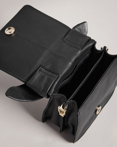 NIYAH-Bags-Small in size and big on style, NIYAH is the ideal bag for jazzing up your look. With two ways to carry and a large bow to top it off, you can carry your essentials with confidence. Crossbody bag Mini size Bow detail Adjustable shoulder strap 100% Bovine leather Dimensions: 9cm x 13cm x 17cm- Ted Baker Romania