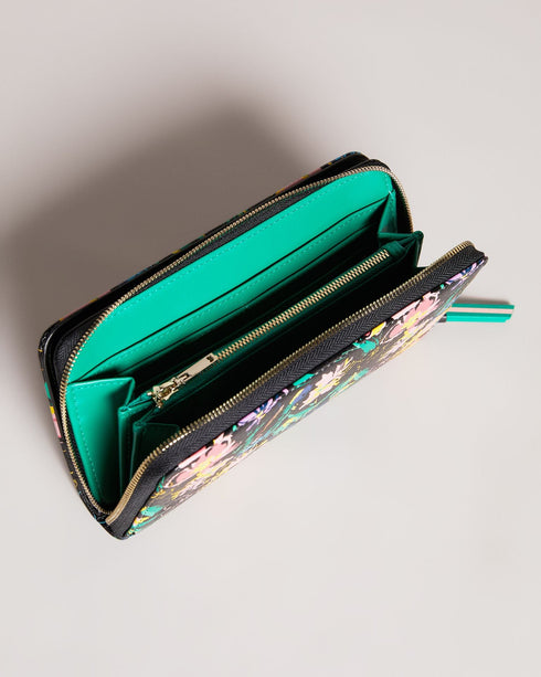 PARCIEA-Small goods-Let your outfit bloom with PARCIEA. This purse will bring the finishing touch to your ensemble with our Sketchy Magnolia print, luxurious glossy leather and a zip fastening to keep your valuables secure. By purchasing this product, you are supporting responsible leather manufacturing through the Leather Working Group. Ted Baker accessories collection Leather purse Popper fastening Card pockets Sketchy Magnolia print Zip closure Ted Baker branded Dimensions: 3cm x 10cm x 19cm- Ted Baker R